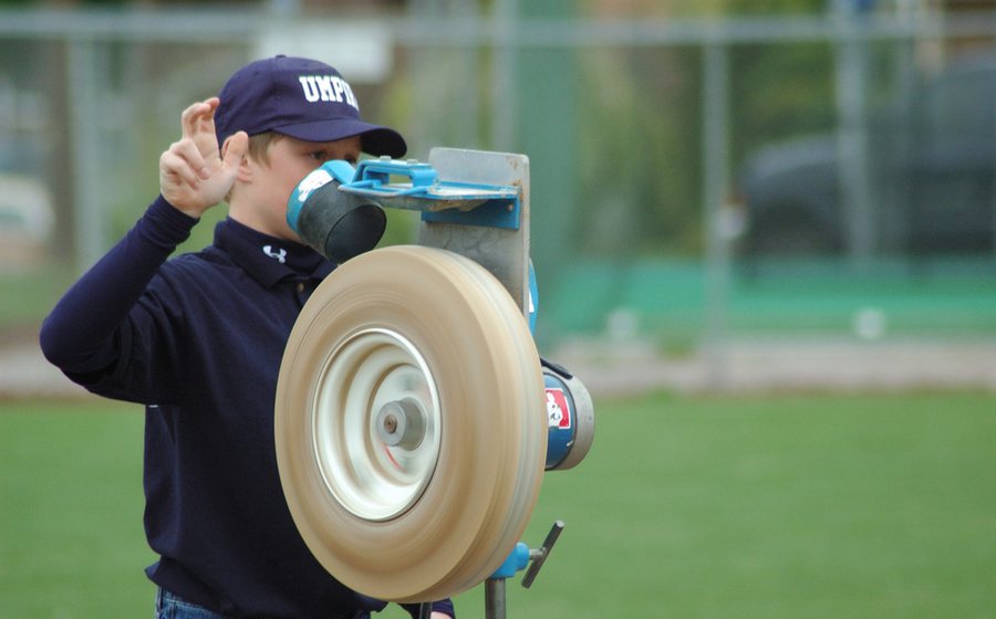 Wheel-style baseball pitching machine (representative photo)